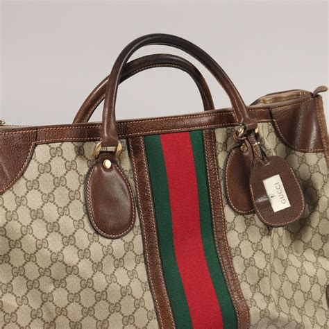 la borsa gucci vintage ha un numero di serie|Come riconoscere le borse Gucci originali dai falsi .